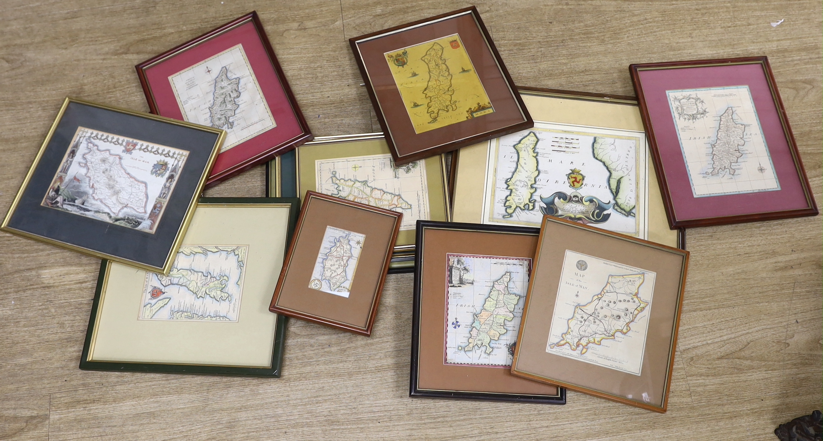 Twelve antique and later maps of the Isle of Man, including examples by John Seller and Thomas Kitchin, mostly hand coloured, largest 30 x 23cm